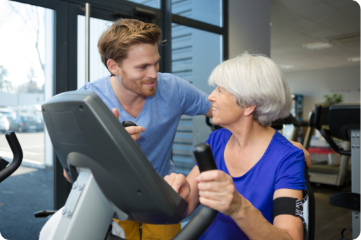 physiotherapist-with-senior-woman-using-exercise-P57YAFF (1)